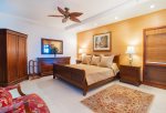 Unwind after a day at the beach in your master bedroom with king bed, flat screen TV and attached lanai